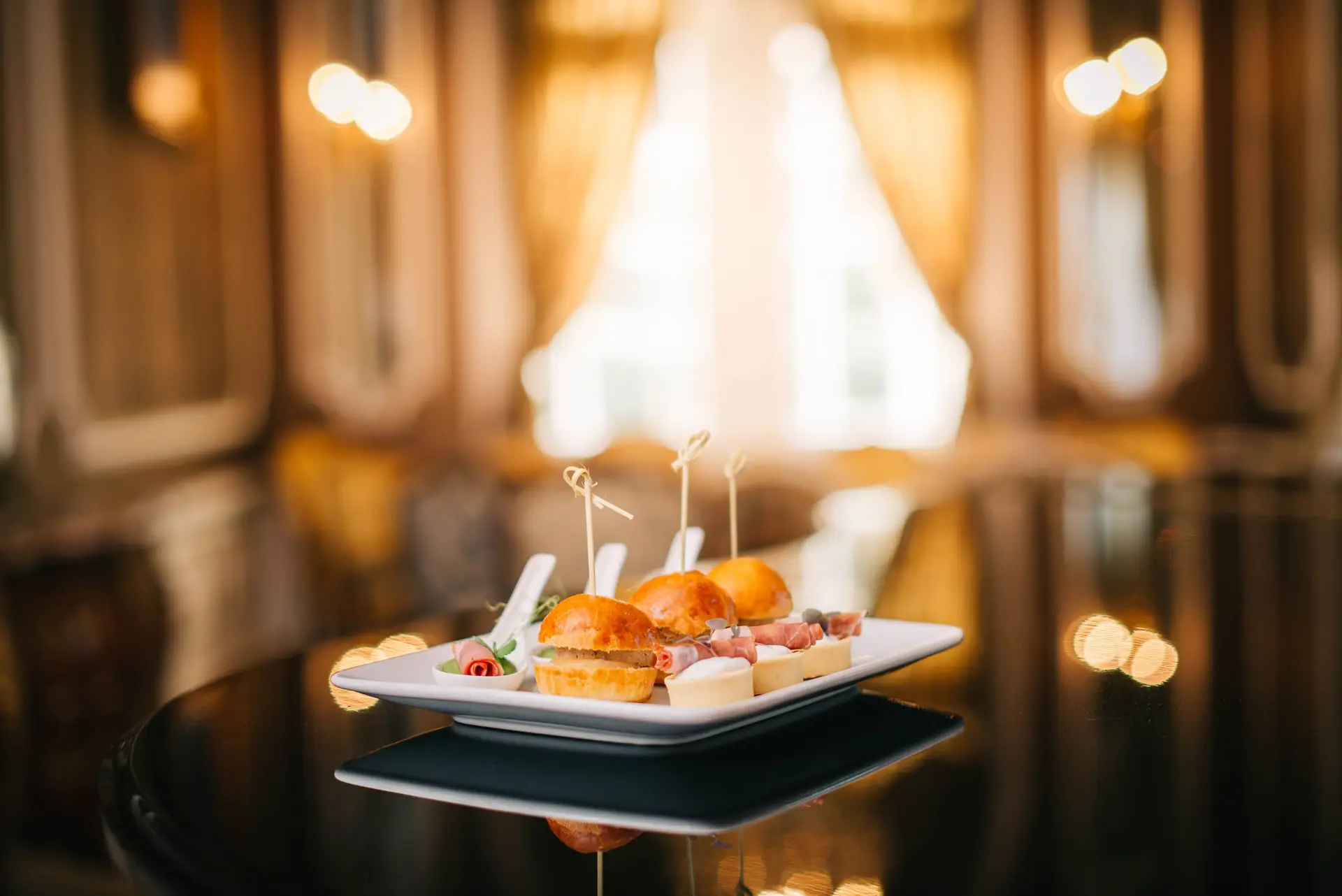 Attentive restaurant service with a plated dish